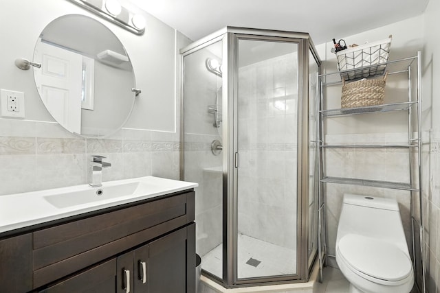 27 S Goodwin Ave, Elmsford, NY 10523 - bathroom featuring tile walls, vanity, and a shower stall