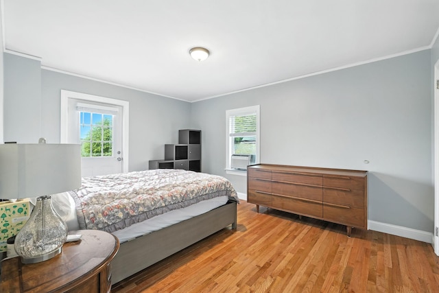 27 S Goodwin Ave, Elmsford, NY 10523 - bedroom featuring crown molding, light wood-type flooring, and cooling unit