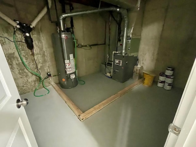728 Woodland Estates Dr, Baldwin, NY 11510 - utility room featuring water heater