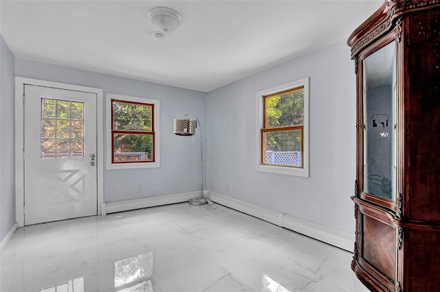 104 Schmidt Ave, Holbrook, NY 11741 - empty room with light marble finish flooring and baseboard heating