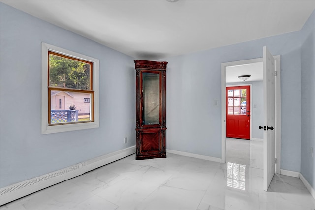 104 Schmidt Ave, Holbrook, NY 11741 - spare room with a baseboard radiator and marble finish floors