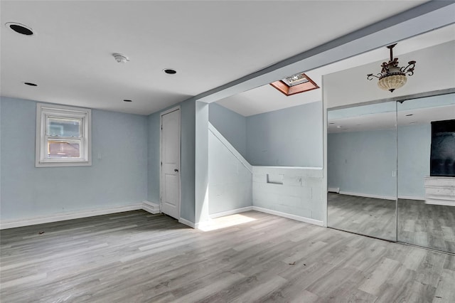104 Schmidt Ave, Holbrook, NY 11741 - unfurnished bedroom featuring wood finished floors and a closet
