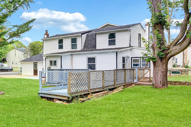 104 Schmidt Ave, Holbrook, NY 11741 - rear view of property featuring a chimney, a wooden deck, roof with shingles, and a lawn