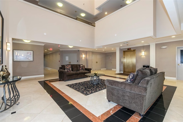 1 Portico Ct Unit 200, Great Neck, NY 11021 - building lobby with crown molding, a towering ceiling, and recessed lighting
