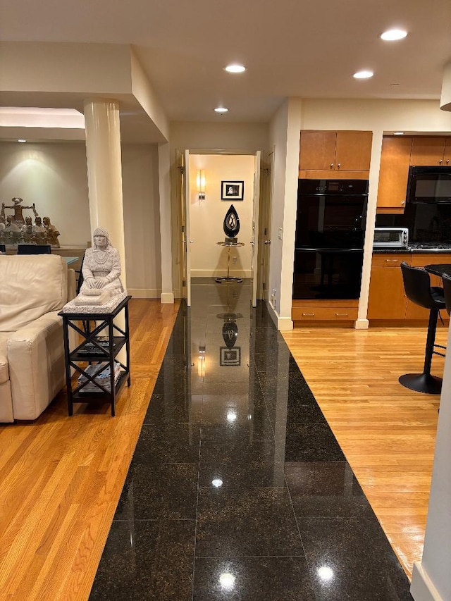 1 Portico Ct Unit 200, Great Neck, NY 11021 - corridor with granite floors and recessed lighting