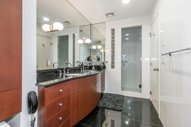 1 Portico Ct Unit 200, Great Neck, NY 11021 - full bath featuring double vanity, a shower stall, tile patterned flooring, and recessed lighting