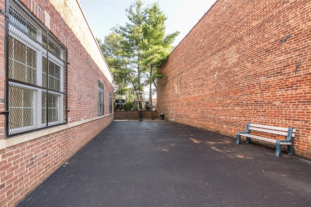 1 Portico Ct Unit 200, Great Neck, NY 11021 - view of side of home with brick siding