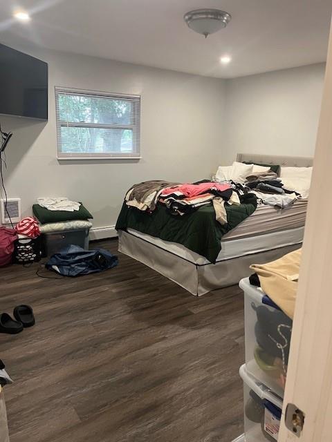 226 14th Ave, West Babylon, NY 11704 - bedroom with wood finished floors and recessed lighting