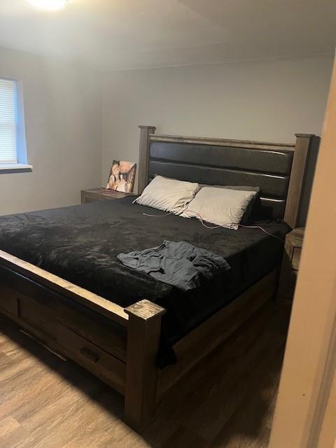 226 14th Ave, West Babylon, NY 11704 - bedroom with light wood-style floors