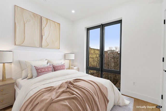 45-29 47th St Unit 3A, Woodside, NY 11377 - bedroom with wood finished floors and recessed lighting