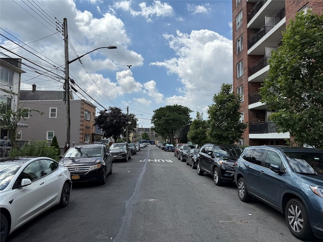 84-70 129th St Unit 2J, Kew Gardens, NY 11415 - view of asphalt street with street lighting