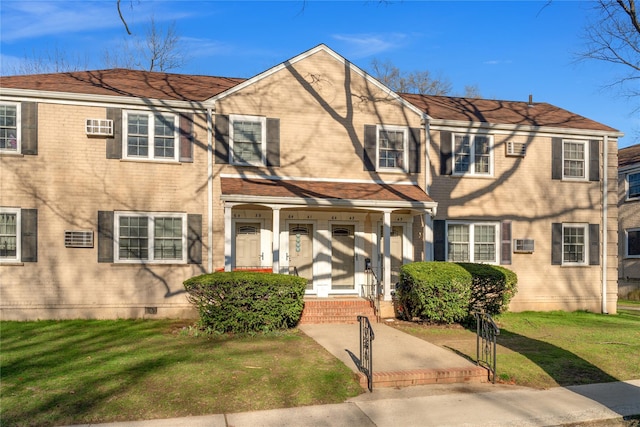 64-41 Springfield Blvd Unit B, Bayside, NY 11364 - townhome / multi-family property with a front yard, crawl space, and brick siding