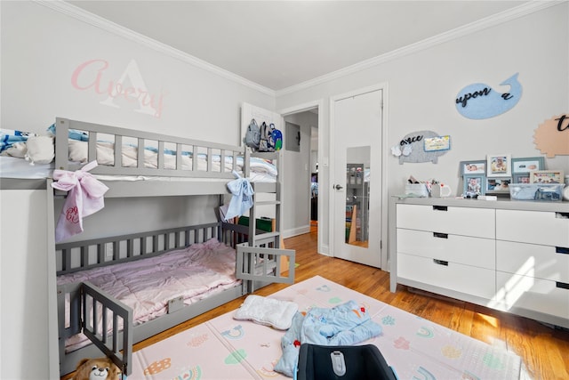 64-41 Springfield Blvd Unit B, Bayside, NY 11364 - bedroom featuring ornamental molding and wood finished floors