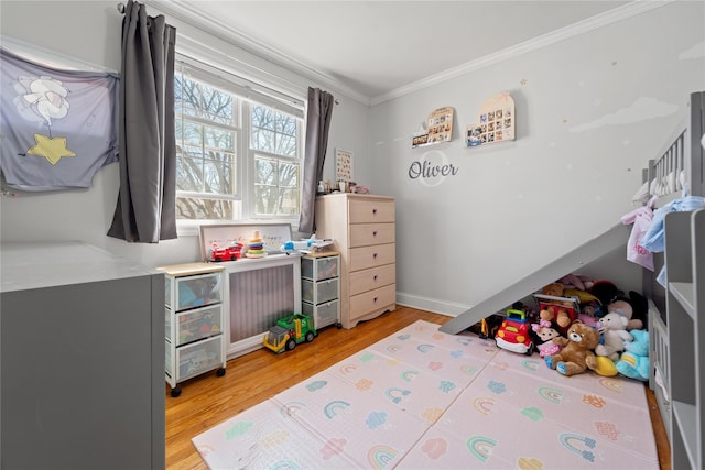 64-41 Springfield Blvd Unit B, Bayside, NY 11364 - bedroom featuring ornamental molding and light wood-style floors