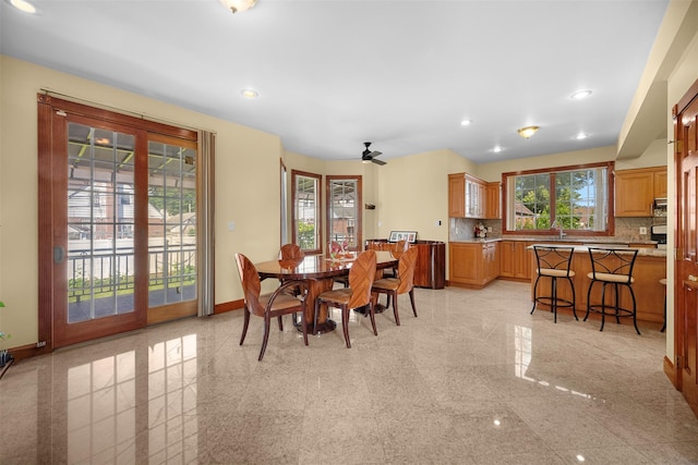 83-14 266th St, Glen Oaks, NY 11004 - dining area with granite floors, recessed lighting, and a ceiling fan