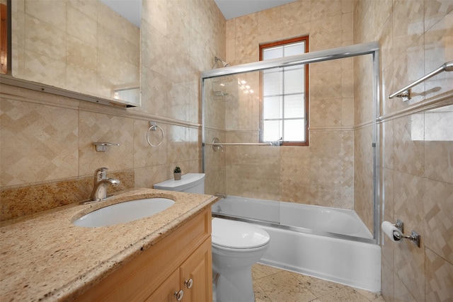 83-14 266th St, Glen Oaks, NY 11004 - bathroom with tile walls, vanity, and enclosed tub / shower combo
