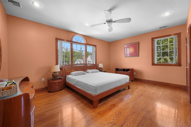 83-14 266th St, Glen Oaks, NY 11004 - bedroom with light wood-style flooring, recessed lighting, and ceiling fan