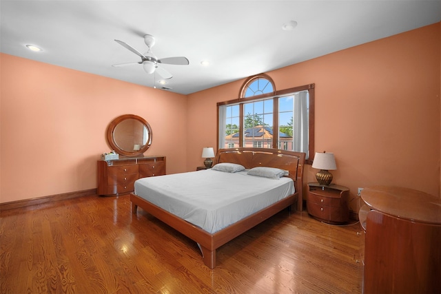 83-14 266th St, Glen Oaks, NY 11004 - bedroom with wood finished floors and a ceiling fan