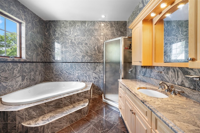 83-14 266th St, Glen Oaks, NY 11004 - full bathroom with vanity, a garden tub, a stall shower, marble finish floors, and recessed lighting