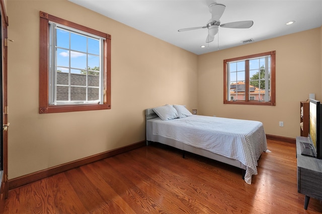 83-14 266th St, Glen Oaks, NY 11004 - bedroom featuring multiple windows, wood finished floors, recessed lighting, and a ceiling fan