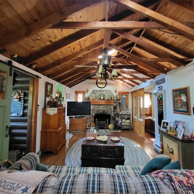 28 E Sullivan Pl, Smallwood, NY 12720 - living area featuring wood finished floors, a stone fireplace, ceiling fan, wood ceiling, and healthy amount of natural light