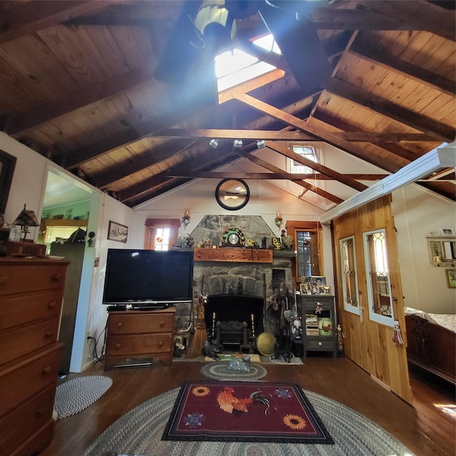 28 E Sullivan Pl, Smallwood, NY 12720 - living area with wood finished floors, wood ceiling, plenty of natural light, and a fireplace