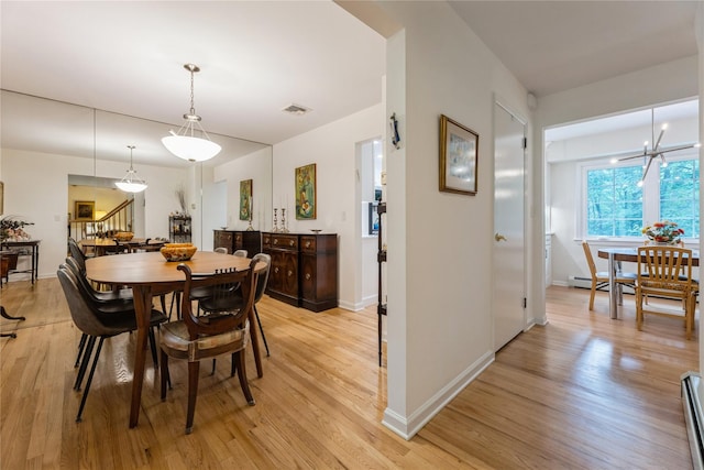 43 Woodglen Dr, New City, NY 10956 - dining room featuring stairs and light wood-style flooring