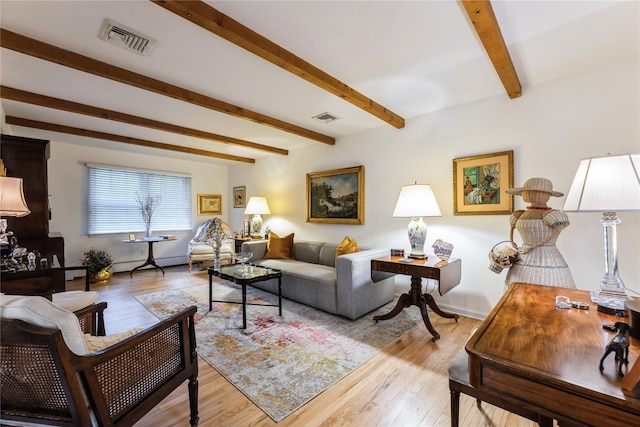 43 Woodglen Dr, New City, NY 10956 - living room with beam ceiling, light wood-style flooring, and baseboard heating