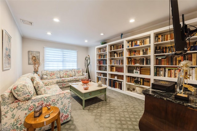 43 Woodglen Dr, New City, NY 10956 - carpeted living room featuring crown molding, recessed lighting, and bookshelves