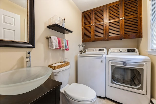 43 Woodglen Dr, New City, NY 10956 - bathroom featuring washer and dryer and vanity
