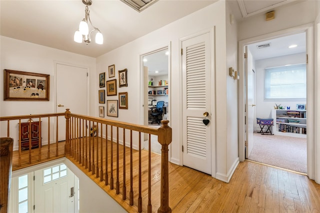 43 Woodglen Dr, New City, NY 10956 - hallway with light wood-style flooring, an office area, and an upstairs landing
