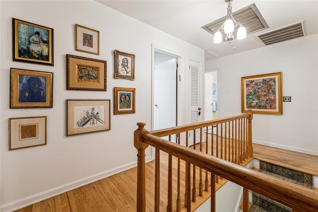 43 Woodglen Dr, New City, NY 10956 - hallway with an upstairs landing and light wood-type flooring