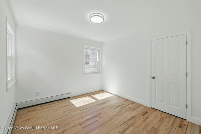 1601 Rte 199, Red Hook, NY 12571 - spare room with wood finished floors and baseboard heating