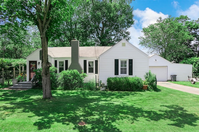 7 Clover Ln, Brookhaven, NY 11719 - ranch-style home with a chimney, concrete driveway, a front yard, and an outbuilding