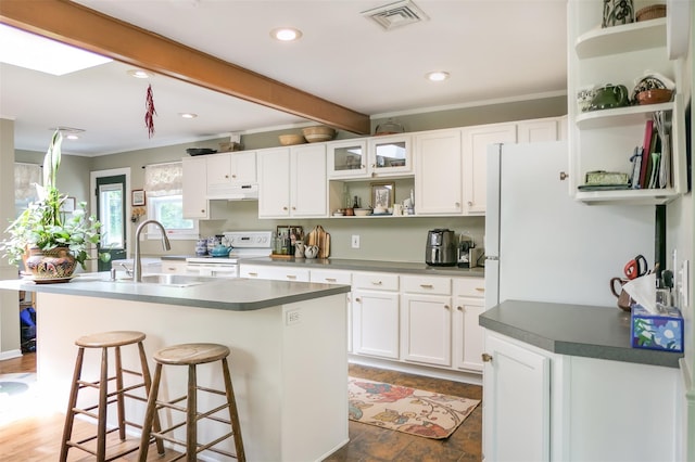 7 Clover Ln, Brookhaven, NY 11719 - kitchen with open shelves, white electric range oven, under cabinet range hood, white cabinetry, and recessed lighting