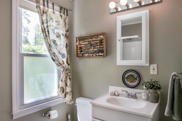 7 Clover Ln, Brookhaven, NY 11719 - bathroom featuring healthy amount of natural light and vanity