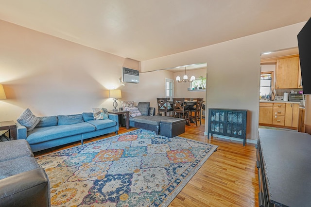 118 Edmund, Lynbrook, NY 11563 - living area with light wood-style floors and a chandelier
