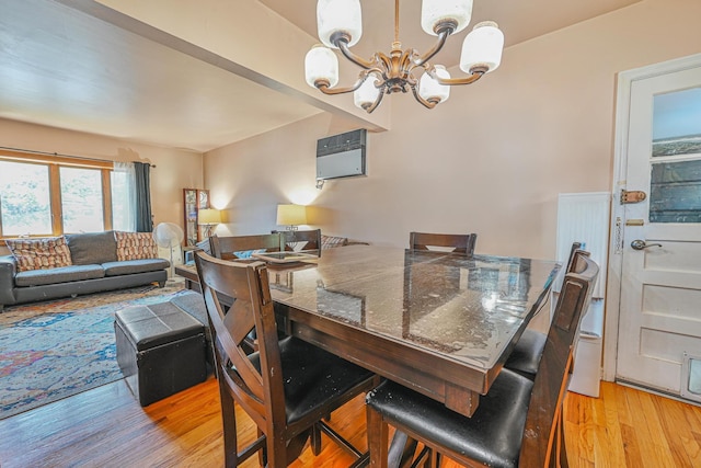 118 Edmund, Lynbrook, NY 11563 - dining area featuring a chandelier and light wood-type flooring
