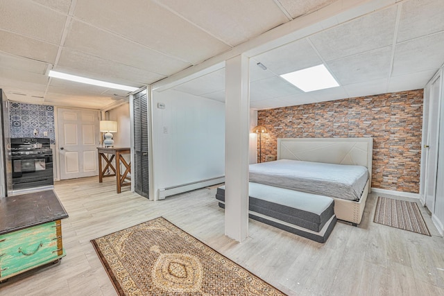 118 Edmund, Lynbrook, NY 11563 - bedroom with a paneled ceiling, a baseboard radiator, and wood finished floors