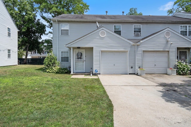 81 Baldwin Rd, Hempstead, NY 11550 - townhome / multi-family property featuring concrete driveway and a front lawn