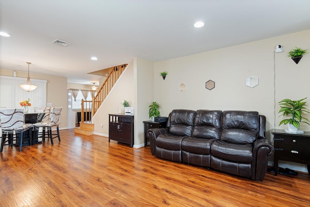 81 Baldwin Rd, Hempstead, NY 11550 - living area with wood finished floors, stairs, and recessed lighting