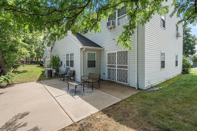 81 Baldwin Rd, Hempstead, NY 11550 - back of house featuring a patio, a yard, and cooling unit