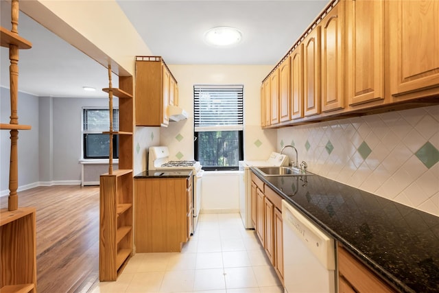 84-39 153rd Ave Unit 1K, Flushing, NY 11414 - kitchen featuring open shelves, white appliances, under cabinet range hood, decorative backsplash, and dark stone countertops