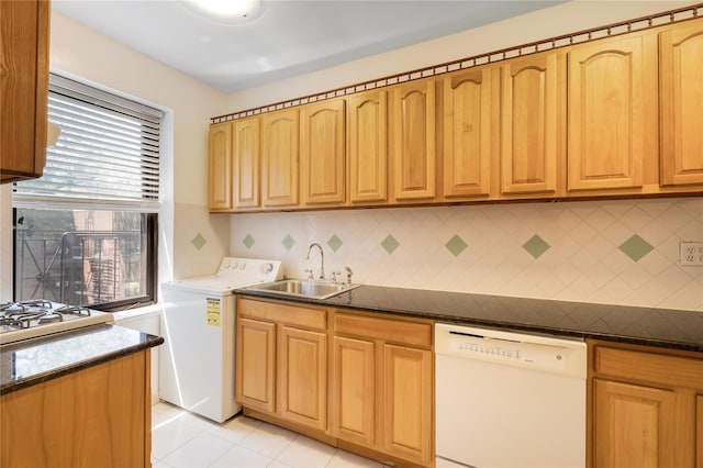 84-39 153rd Ave Unit 1K, Flushing, NY 11414 - kitchen featuring white dishwasher, washer / clothes dryer, backsplash, light tile patterned floors, and light brown cabinetry