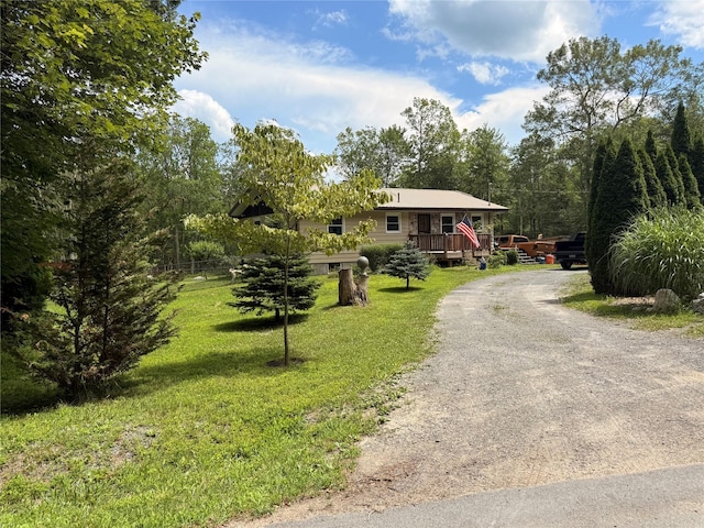 69 Finkle Rd, Summitville, NY 12790 - ranch-style home with driveway, a front yard, and a deck