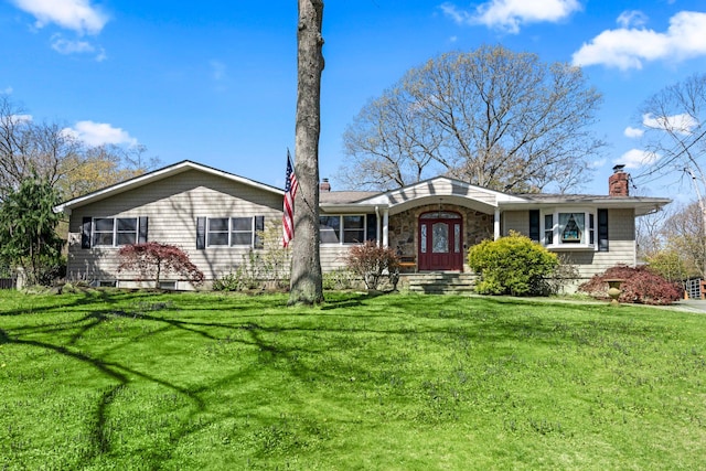 24 Croft Ln, Smithtown, NY 11787 - view of front facade featuring a chimney and a front lawn