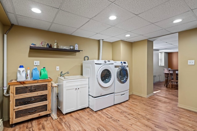 24 Croft Ln, Smithtown, NY 11787 - laundry room with washer and dryer, light wood-style floors, and recessed lighting