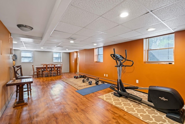 24 Croft Ln, Smithtown, NY 11787 - workout area featuring wood finished floors, recessed lighting, and a paneled ceiling