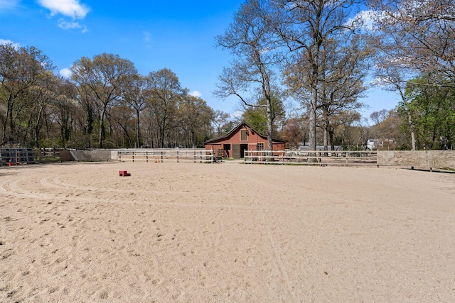 24 Croft Ln, Smithtown, NY 11787 - view of yard with an outdoor structure, a barn, an outdoor riding arena, and view of scattered trees