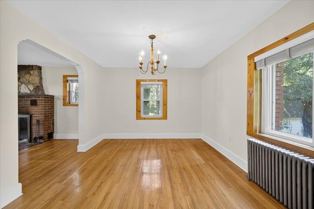 1095 State Route 94, New Windsor, NY 12553 - spare room featuring radiator, plenty of natural light, and light wood-style floors